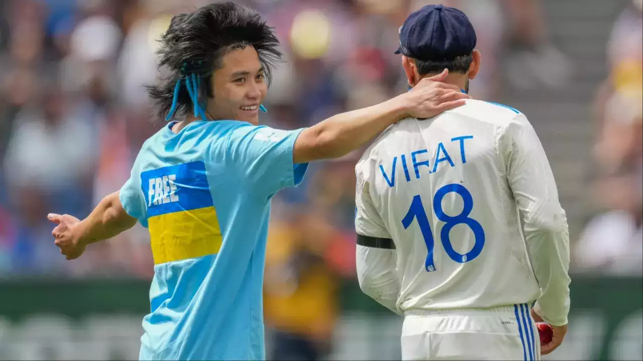 Pitch Invader With 'Free Ukraine' Slogan On T-Shirt Hugs Virat Kohli, Taken Off By Security Guards- WATCH